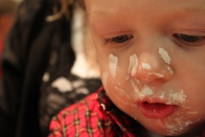16-month-old Brody enjoys making (read: eating) gingerbread houses (December 4, 2011 at Christ Church in upstate NY)